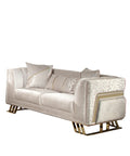 Luxury sofa with decorative pillows in a stylish room setting.