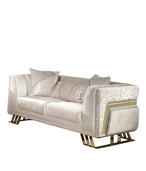 Luxury sofa with decorative pillows in a stylish room setting.